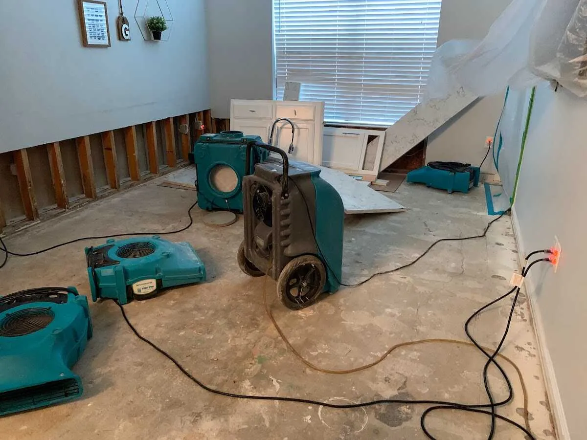 Dehumidifier in flood-cut room for Water Damage Restoration in Cherry Hill